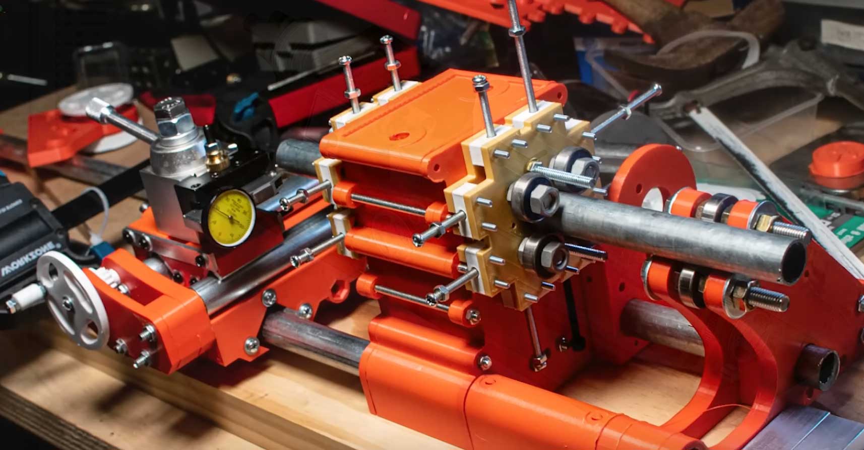 A YouTube user presents a small 3D printed metalworking lathe